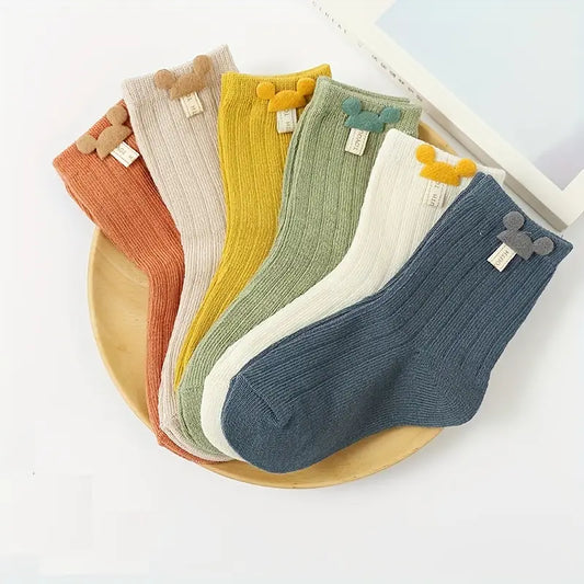 Lot de 4 paires de chaussettes mi-mollet en coton pour tout-petits – Respirantes et unisexes (tons neutres)